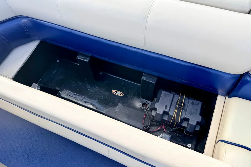 Slide: The Image of Storage compartment in a 2000 Harris-Kayot Classic 220 O/B boat with battery box. - 40