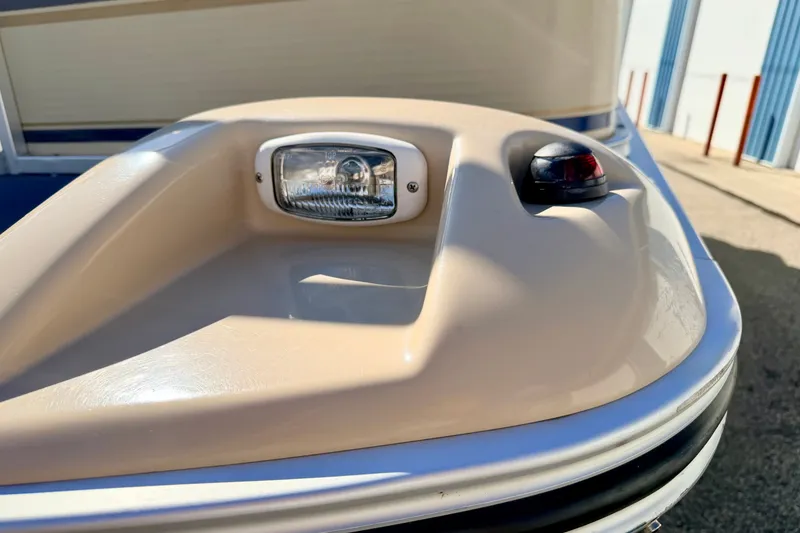 Slide: The Image of Close-up of 2000 Harris-Kayot Classic 220 O/B boat's bow with navigation light. - 70
