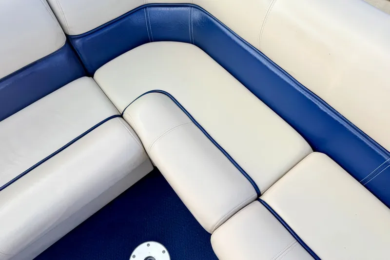 Slide: The Image of Blue and white seating on 2000 Harris-Kayot Classic 220 O/B boat. - 37
