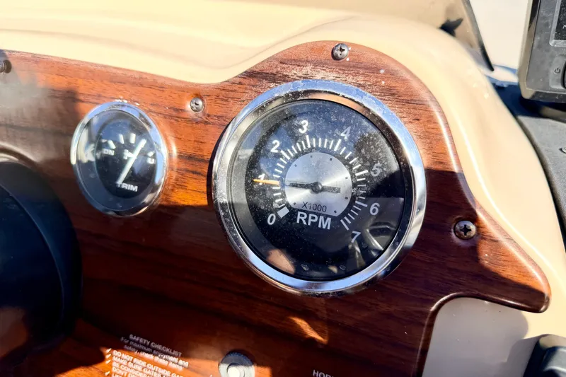 Slide: The Image of Close-up of 2000 Harris-Kayot Classic 220 O/B boat dashboard with RPM gauge. - 63