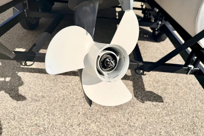 Slide: The Image of Propeller of 2000 Harris-Kayot Classic 220 O/B boat on trailer. - 19