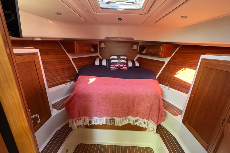 Slide: The Image of Luxurious cabin interior of 2025 Back Cove 39O yacht with cozy bedding. - 5