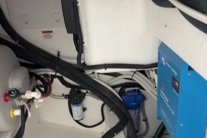 Slide: The Image of Engine room of 2025 Back Cove 39O boat with wiring and equipment. - 41