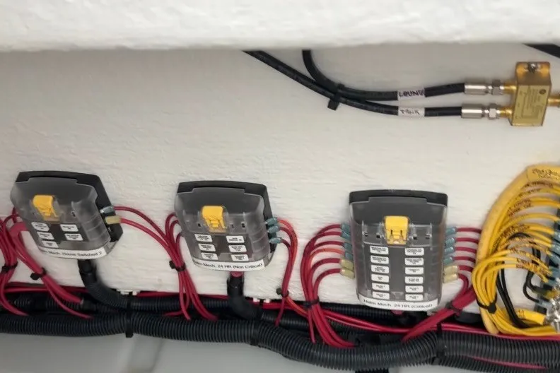 Slide: The Image of Electrical panel with labeled wires in a 2025 Back Cove 39O boat. - 42