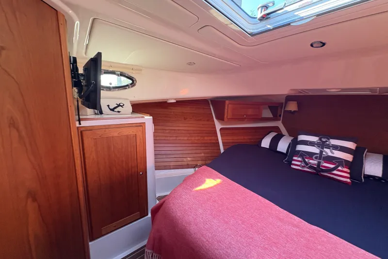 Slide: The Image of Luxurious cabin interior of 2025 Back Cove 39O yacht with nautical decor. - 8