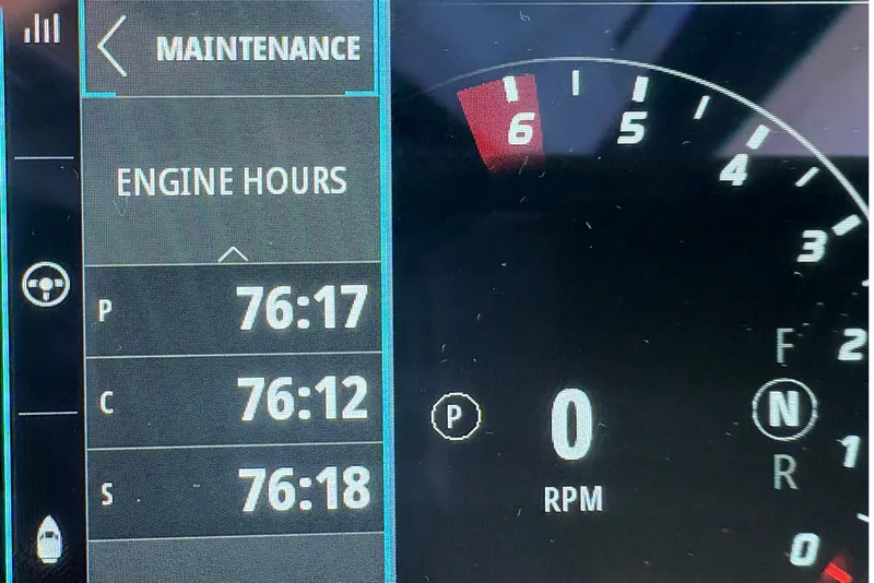 Slide: The Image of Dashboard of 2025 Back Cove 39O showing engine hours and RPM gauge. - 35