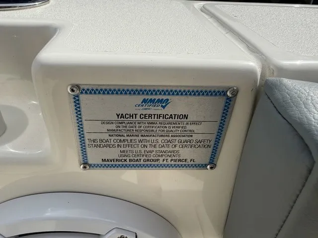 Slide: The Image of Yacht certification plaque on a 2024 Cobia 280 Center Console boat. - 36