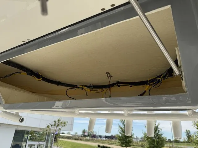 Slide: The Image of A view of a boat deck interior with cables and mounts visible. - 24