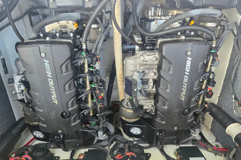 Slide: The Image of 2013 Yamaha Boats AR240 HO high output engines in a boat compartment. - 14