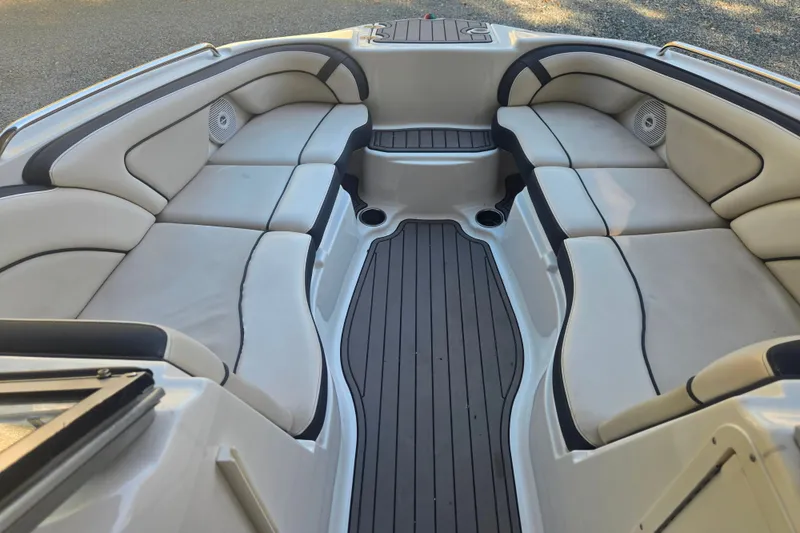 Slide: The Image of 2013 Yamaha Boats AR240 HO interior with spacious seating and sleek design. - 4
