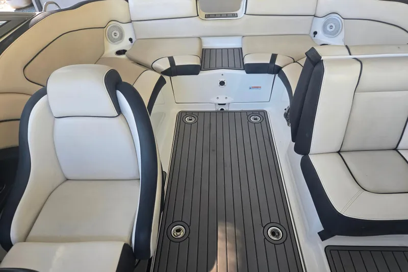 Slide: The Image of 2013 Yamaha Boats AR240 HO interior with sleek seating and modern design. - 7