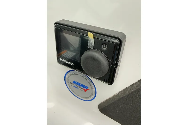 Slide: The Image of Webasto control panel on 2025 Axopar 37 XC Cross Cabin, featuring NMMA certification. - 27