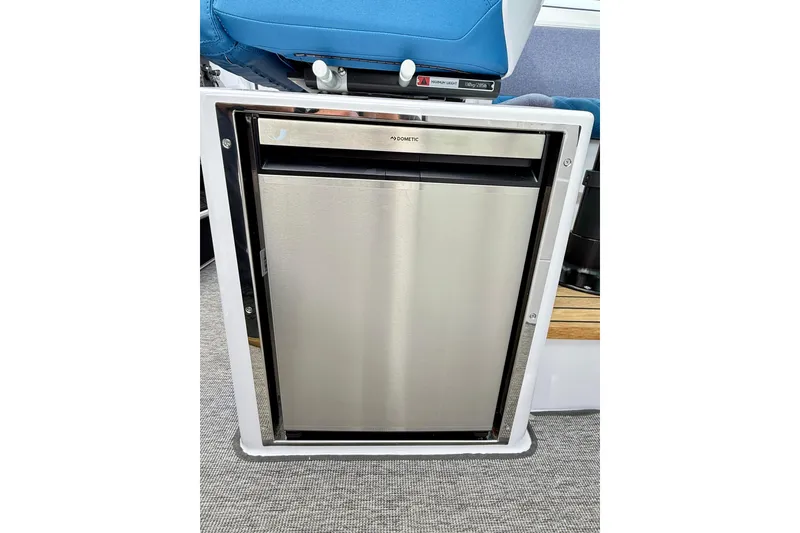 Slide: The Image of Stainless steel refrigerator in 2025 Axopar 37 XC Cross Cabin boat interior. - 20