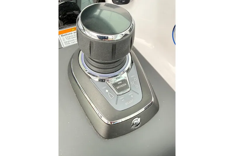 Slide: The Image of Joystick control panel on 2025 Axopar 37 XC Cross Cabin boat. - 25
