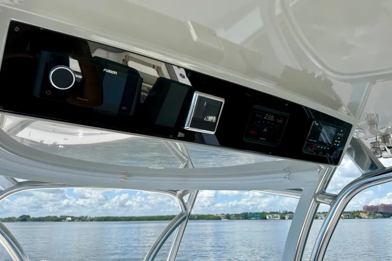 Slide: The Image of 2024 Valhalla V-33 boat dashboard with modern navigation and control systems. - 25