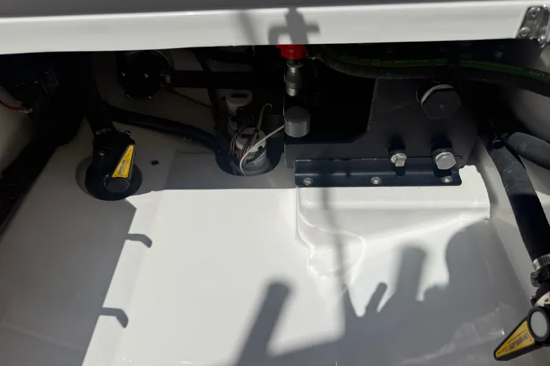Slide: The Image of Engine compartment of 2024 Valhalla V-33 boat, showcasing mechanical components and wiring. - 28