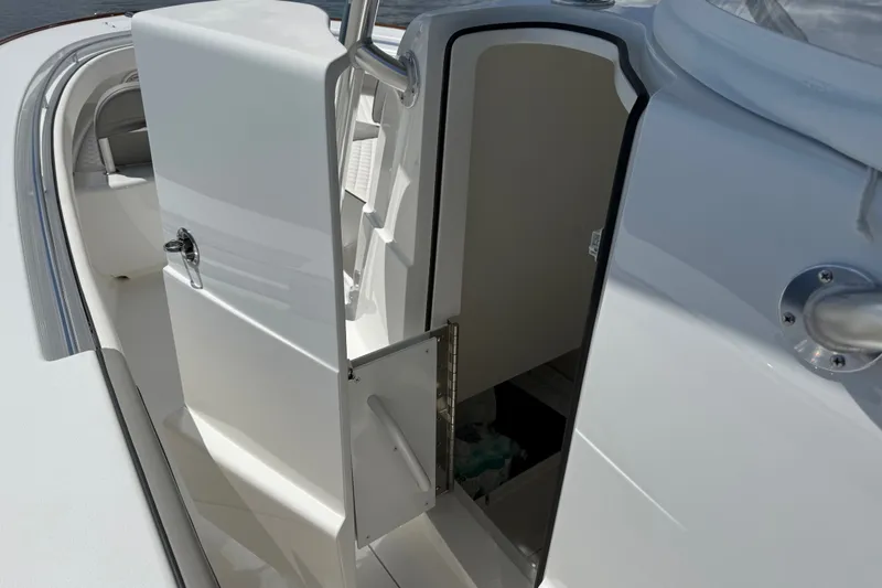 Slide: The Image of 2024 Valhalla V-33 boat interior with open cabin door, showcasing sleek design. - 19