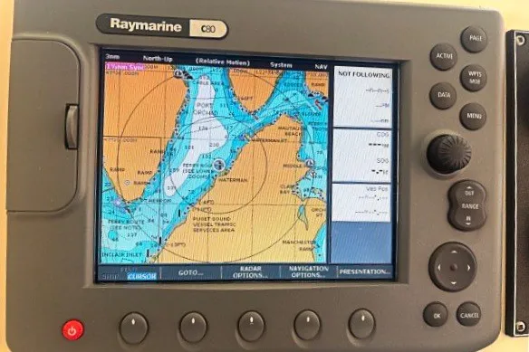 Slide: The Image of Raymarine C80 navigation system on 2005 Camano 31 Troll boat, displaying nautical chart. - 9