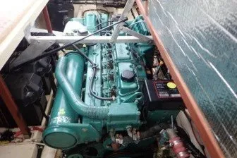 Slide: The Image of 2005 Camano 31 Troll engine compartment with visible marine engine components. - 36