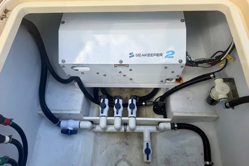 Slide: The Image of Seakeeper 2 stabilizer system in a 2021 Conch 33 boat compartment. - 33