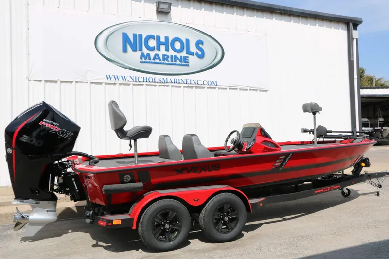 Slide: The Image of A red 2027 Vexus AVX 2080 boat on a trailer in front of a building. - 10