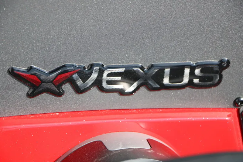 Slide: The Image of Close-up of the Vexus logo on a boat. - 49
