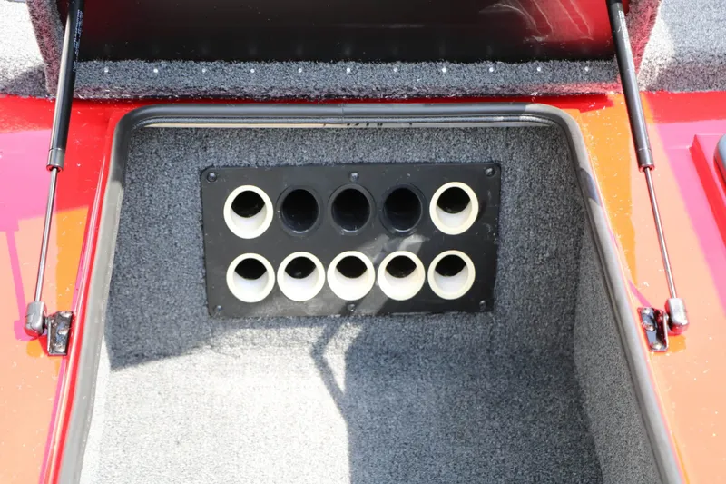 Slide: The Image of An open storage compartment with multiple rod tubes in a Vexus AVX 2080 boat. - 43