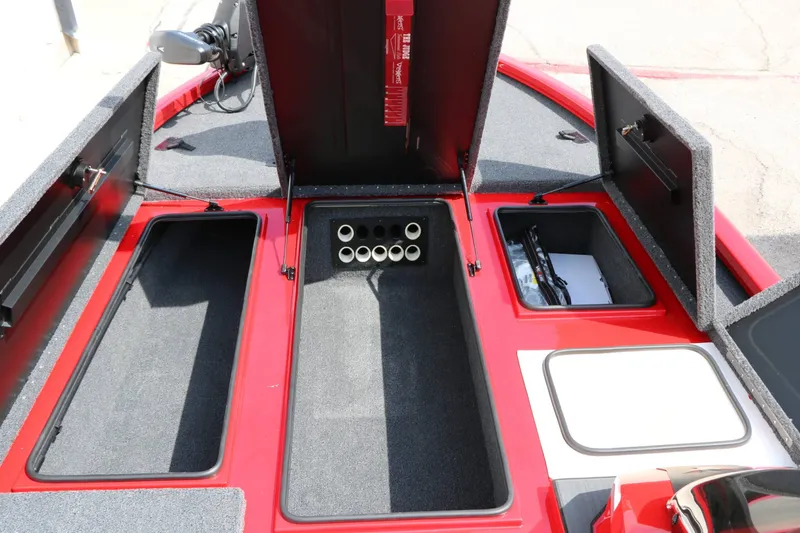 Slide: The Image of The image shows the deck of a Vexus AVX 2080 boat with open storage compartments. - 42