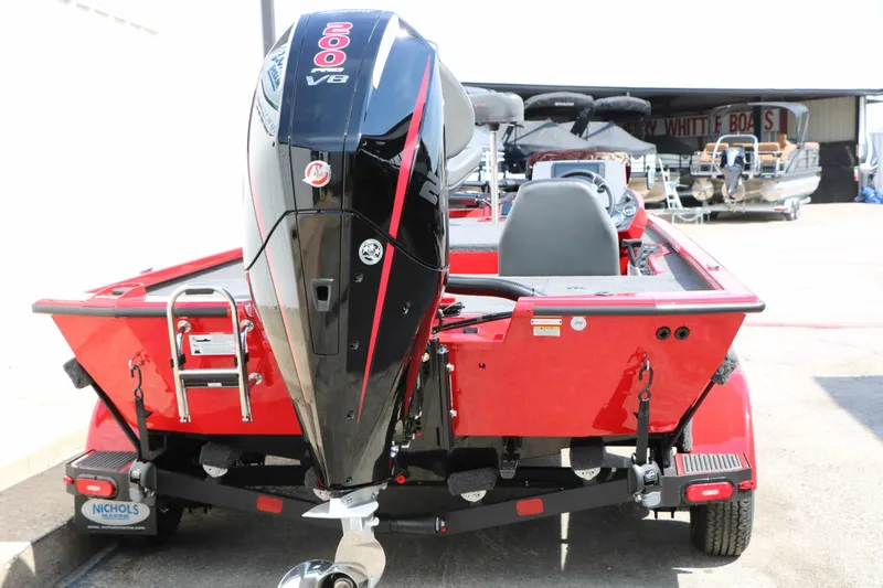 Slide: The Image of A red 2027 Vexus AVX 2080 boat with a powerful outboard motor. - 13