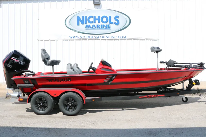 Slide: The Image of A red 2027 Vexus AVX 2080 boat on a trailer in front of a building. - 3