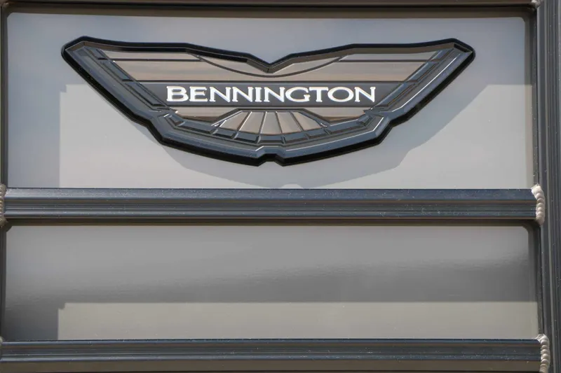 Slide: The Image of Close-up of the Bennington logo on a 2027 24 MSL Tri Toon. - 10