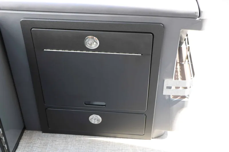 Slide: The Image of A black cabinet with two lockable compartments on a boat. - 41