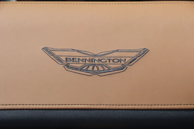 Slide: The Image of Close-up of the Bennington logo on beige upholstery. - 37