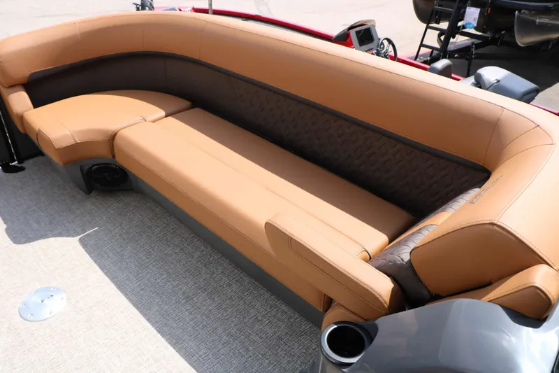 Slide: The Image of Luxurious upholstered seating on a Bennington 24 MSL Tri Toon, featuring brown and black leather. - 38