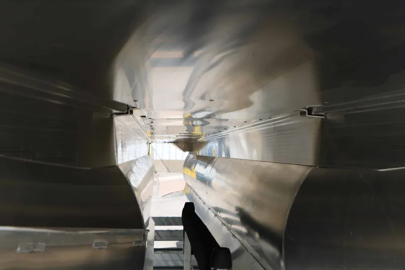 Slide: The Image of Underside of a 2027 Bennington 24 MSL Tri Toon, showcasing the aluminum construction. - 12