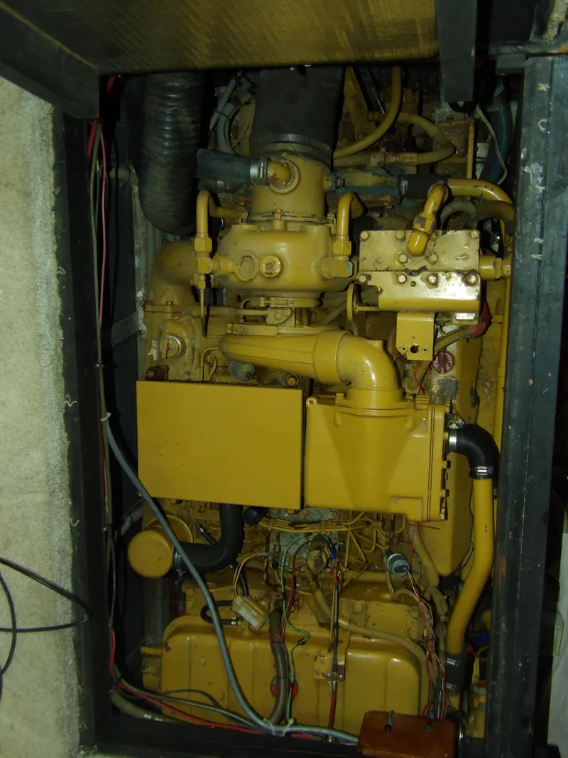 Slide: The Image of Engine compartment of 1989 Sea Ray 440 Aft Cabin boat. - 62