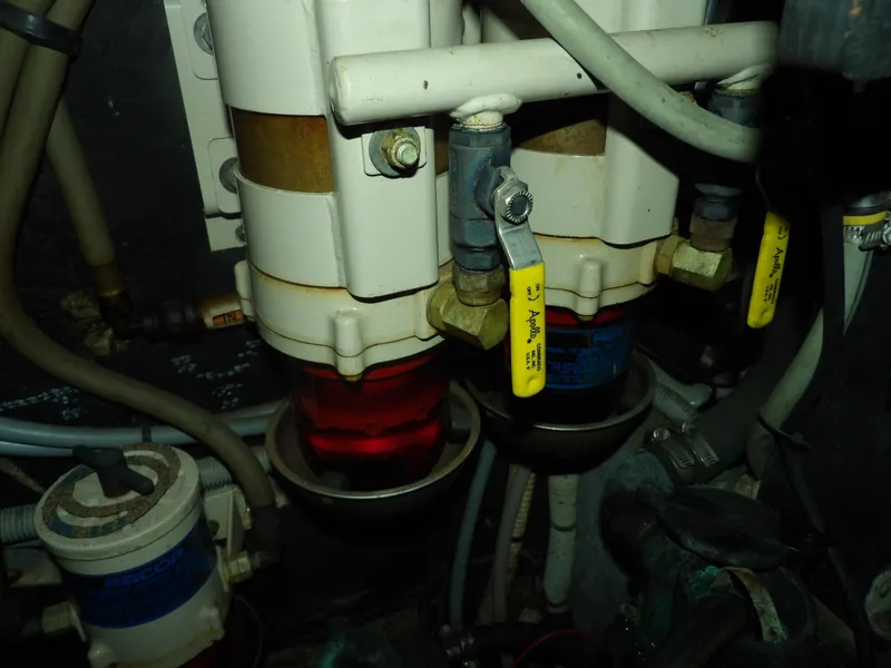 Slide: The Image of Engine room components of 1989 Sea Ray 440 Aft Cabin yacht. - 68