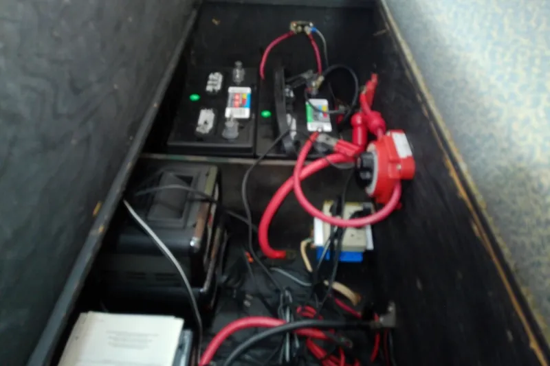 Slide: The Image of Electrical wiring and components inside a 1989 Sea Ray 440 Aft Cabin boat. - 56