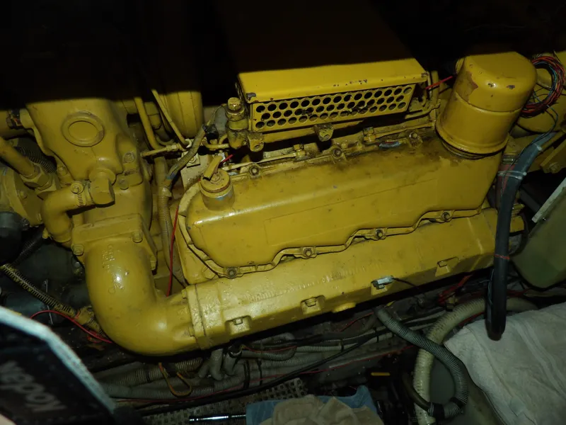 Slide: The Image of 1989 Sea Ray 440 Aft Cabin engine, yellow, detailed view. - 65