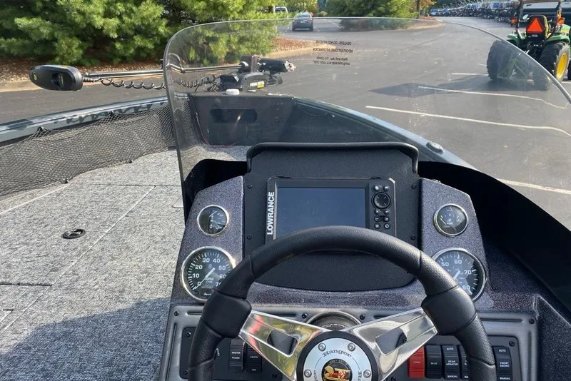 Slide: The Image of 2026 Ranger VS1882SC Angler boat dashboard with steering wheel and navigation system. - 4