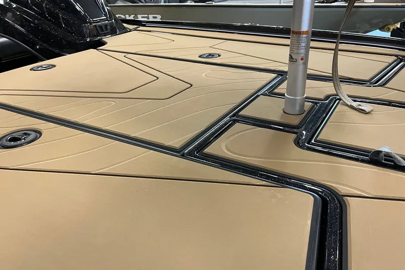 Slide: The Image of 2027 Nitro Z20 XL Pro boat deck with tan panels and black trim. - 13