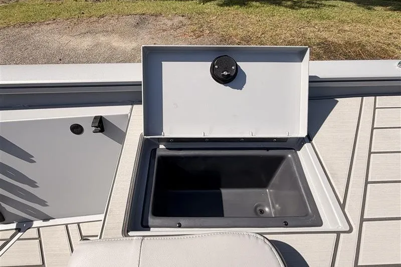 Slide: The Image of Open storage compartment on 2027 Tracker Bass Tracker 175 CC boat deck. - 17