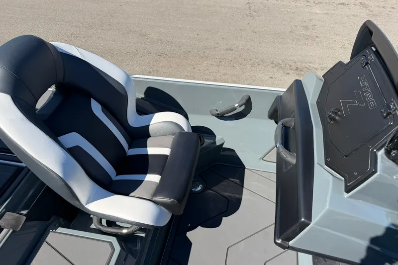 Slide: The Image of 2027 Nitro Z20 XL Pro boat interior with sleek seating and control panel. - 28