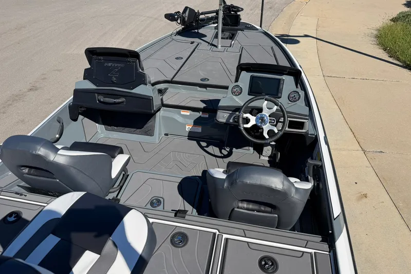 Slide: The Image of 2027 Nitro Z20 XL Pro boat interior with modern dashboard and seating. - 81