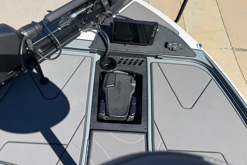 Slide: The Image of 2027 Nitro Z20 XL Pro boat deck with control panel and foot pedal. - 17