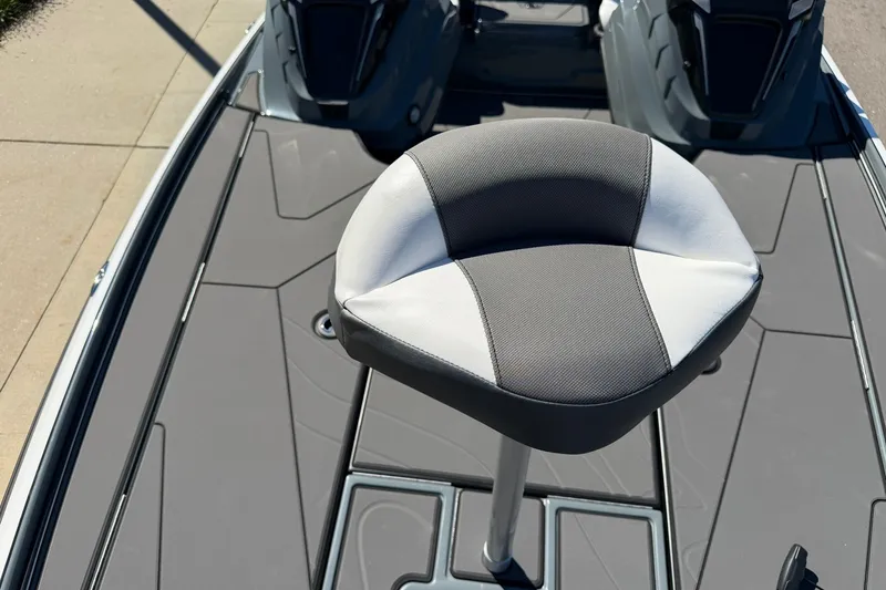 Slide: The Image of 2027 Nitro Z20 XL Pro boat with a cushioned seat on a sleek deck. - 16