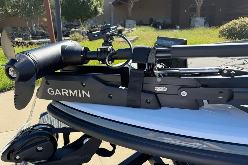 Slide: The Image of 2027 Nitro Z20 XL Pro with Garmin trolling motor, parked outdoors. - 21