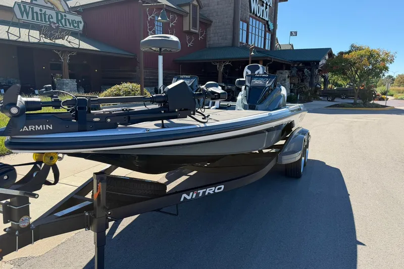 Slide: The Image of 2027 Nitro Z20 XL Pro boat parked outside White River Fly Shop. - 13