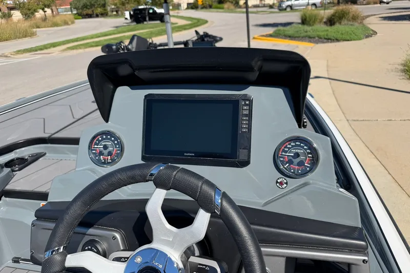 Slide: The Image of Dashboard of a 2027 Nitro Z20 XL Pro boat with Garmin display and gauges. - 33