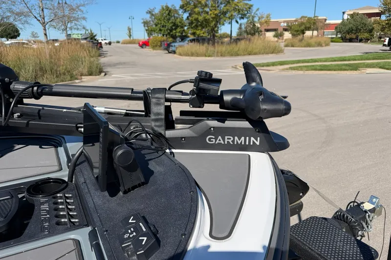 Slide: The Image of 2027 Nitro Z20 XL Pro boat with Garmin navigation system in a parking lot. - 20